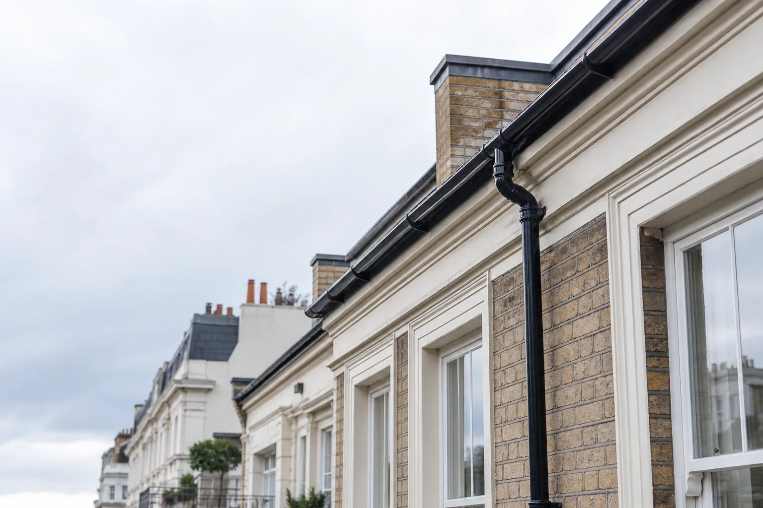 Rain gutter and downpipe on a Westminster-style period property
